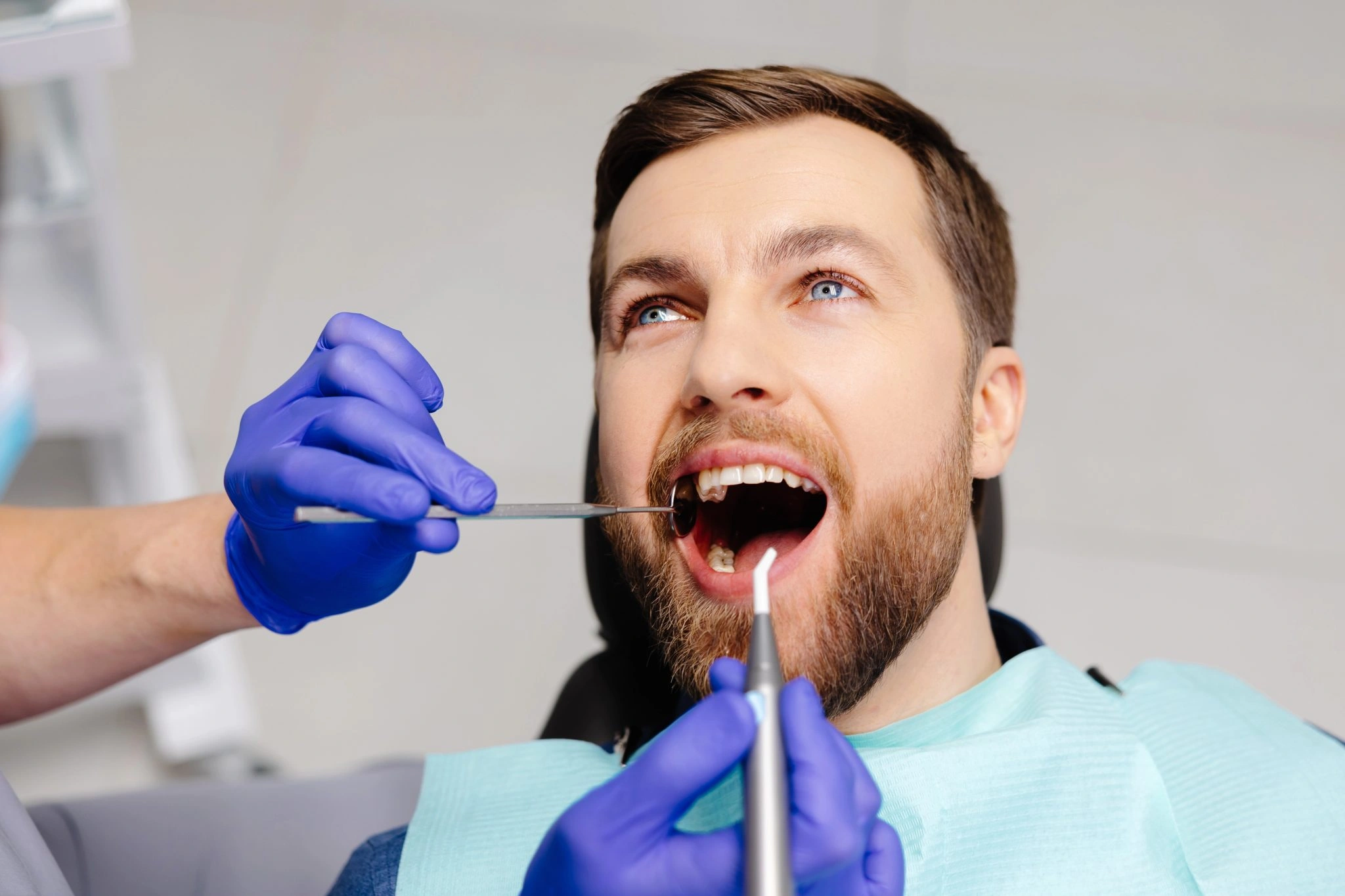 Patient having a dental examination with a dentist