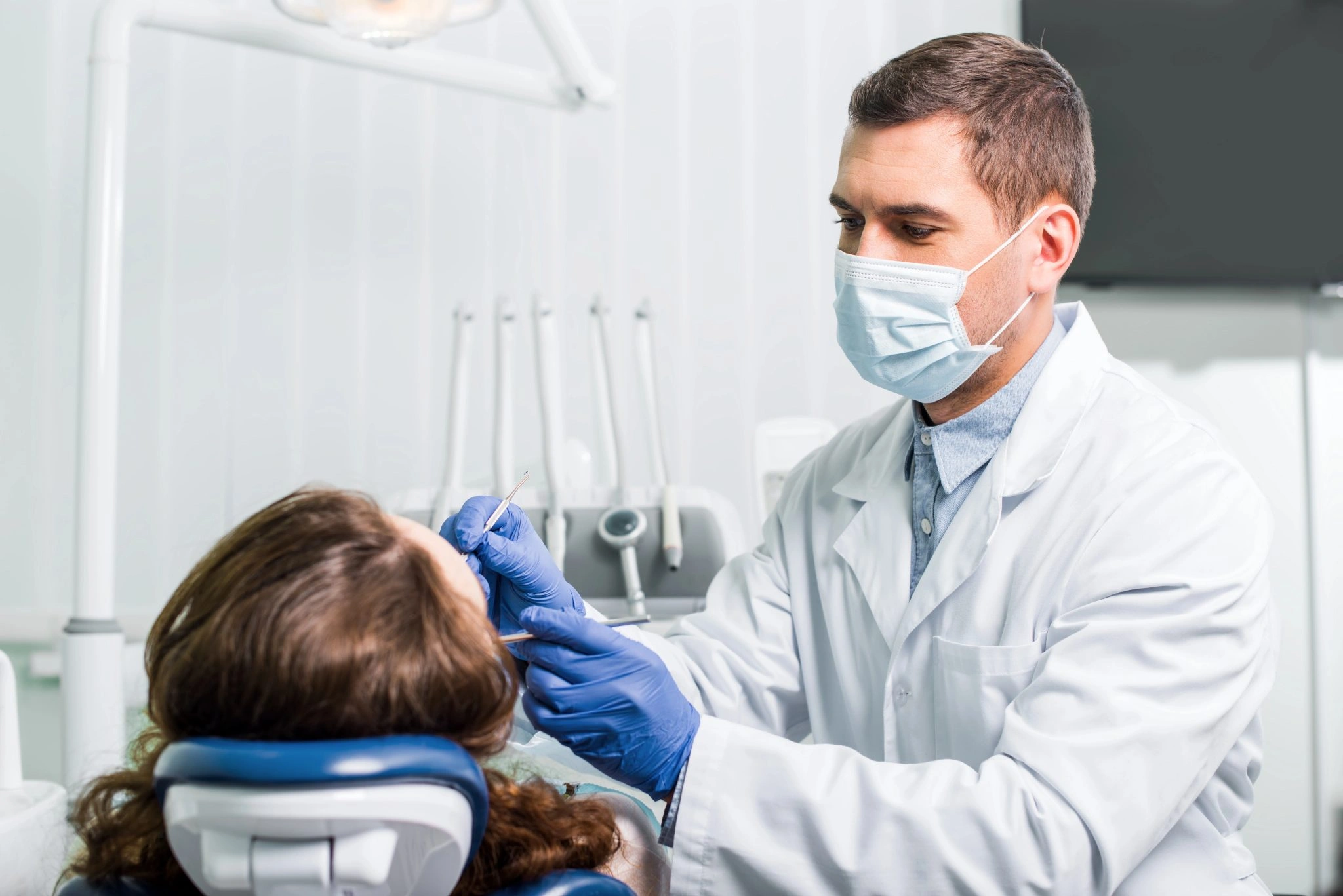 Dentist reviewing treatment information with a patient