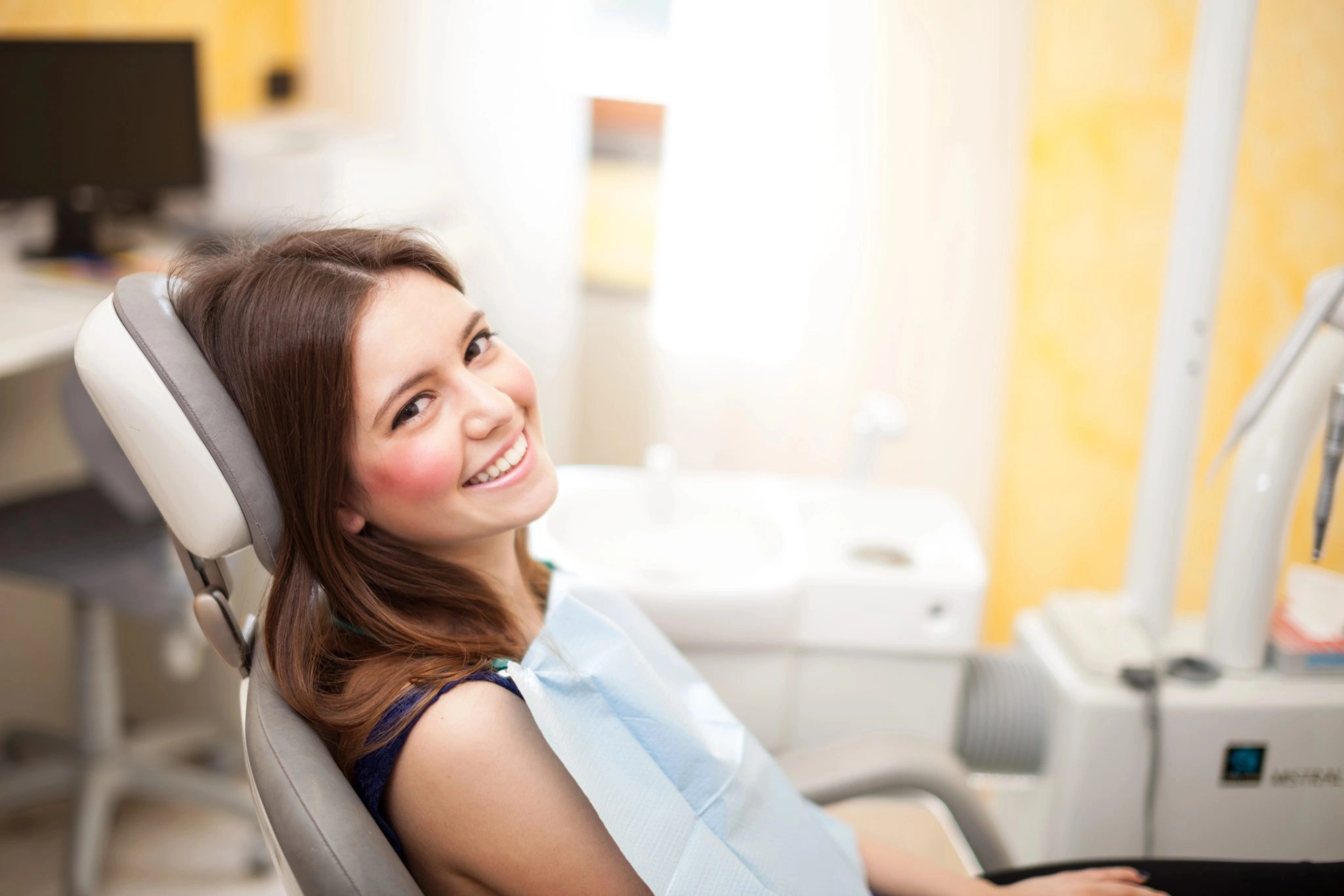 Smiling patient during a dental consultation appointment