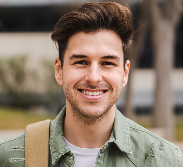 A smiling man looking to find a local dentist near Littleton, CO